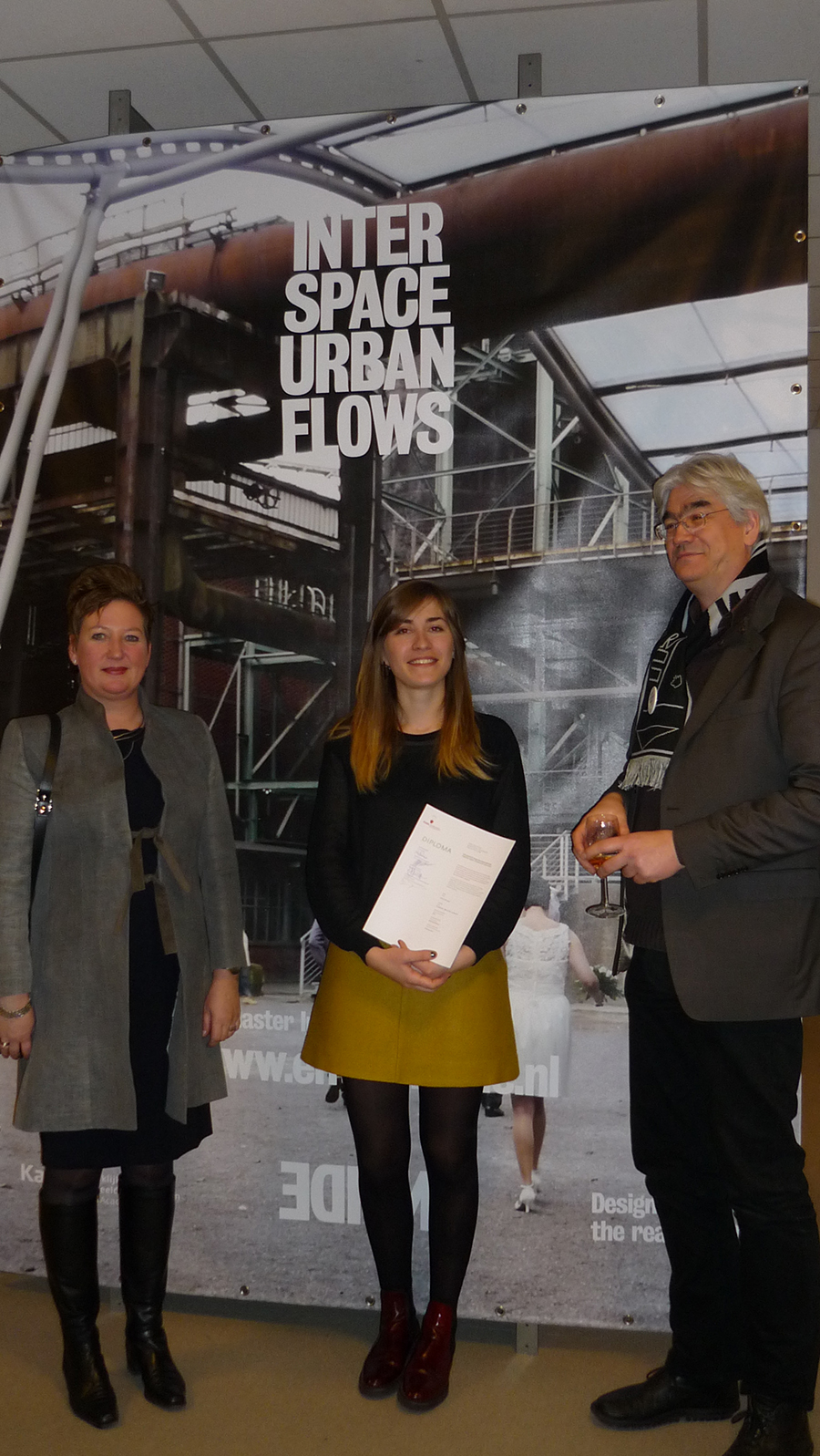 KABK's Director Marieke Schoenmakers (left) awarded her first KABK (Master) Diploma to INSIDE's Graduate Photeini Mermyga (middle) 